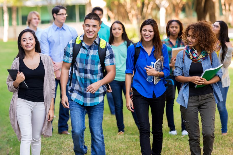 teens walking on campus